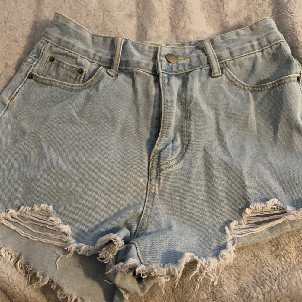 Light denim ripped jean shorts